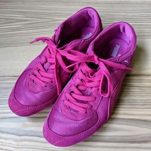 Puma pink running shoes with suede details